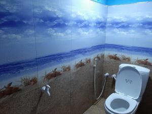 Koupelna v ubytování Kande Gedara Resort (කන්දෙ ගෙදර)