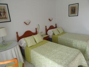 Postel nebo postele na pokoji v ubytování Hotel Crystal Park