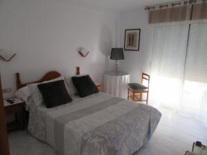 Postel nebo postele na pokoji v ubytování Hotel Crystal Park