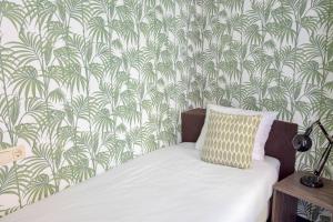 Voodi või voodid majutusasutuse Hotel Sebel toas