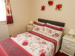 Кровать или кровати в номере Cherry Pips