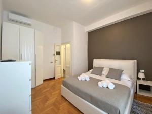 Posteľ alebo postele v izbe v ubytovaní Via Benzi Apartment Como