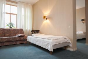 Postel nebo postele na pokoji v ubytování Guesthouse Jakob Lenz