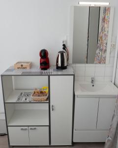 A kitchen or kitchenette at Hostal Santa Cruz