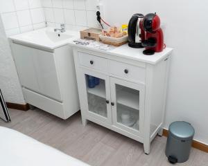 A kitchen or kitchenette at Hostal Santa Cruz