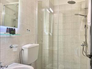 Koupelna v ubytování IONIAN SUITES by Bruskos