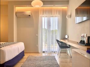 Postel nebo postele na pokoji v ubytování IONIAN SUITES by Bruskos + 37 fotografií
