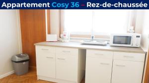 מטבח או מטבחון ב-Appartement Cosy 36 Salins les Bains