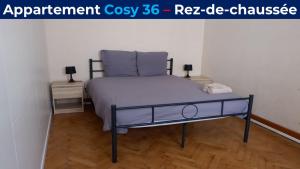 מיטה או מיטות בחדר ב-Appartement Cosy 36 Salins les Bains