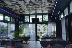 Reštaurácia alebo iné gastronomické zariadenie v ubytovaní Primus Hotel & Apartments