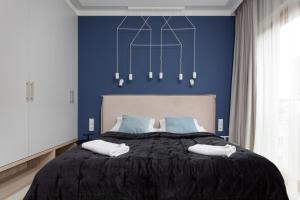 Posteľ alebo postele v izbe v ubytovaní Apartments Warsaw Pawia by Noclegi Renters
