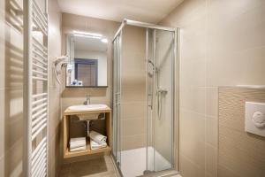 Ett badrum på Hotel Istra - Liburnia