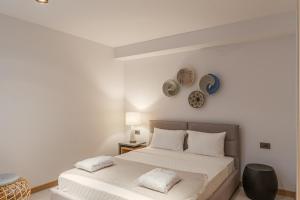 Postel nebo postele na pokoji v ubytování G Beyond Residences & Villas, Yalıkavak, Bodrum