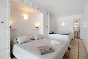 Posteľ alebo postele v izbe v ubytovaní Casa Gofio