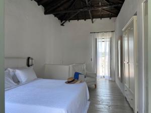 Posteľ alebo postele v izbe v ubytovaní Raphael Skiathos Living-Venetia