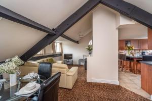 a kitchen and living room in a loft conversion at Mountain View in Keswick