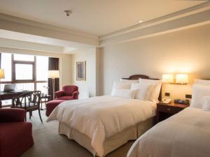 Letto o letti in una camera di Swissotel Lima