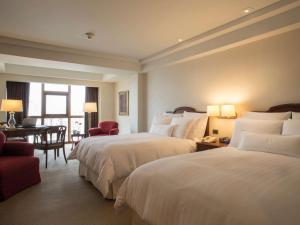 Letto o letti in una camera di Swissotel Lima