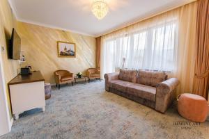 TV a/nebo společenská místnost v ubytování Moviliţa Residence