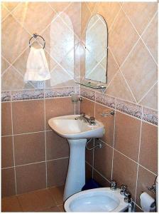Een badkamer bij Complejo Los Arrayanes