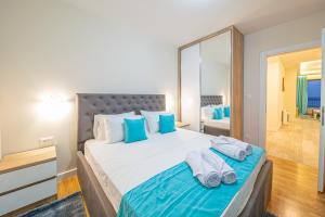 Llit o llits en una habitació de Mar Azul Apartments Petrovac