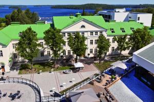 an aerial view of a building with a green roof at Villa Gardens in Imatra