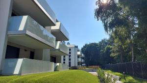 Vonkajšia záhrada v ubytovaní Apartament Mare , Rewal ulica Szczecińska 21 Apartament nr 3