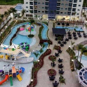 a pool in a resort with a water park at Salinas Exclusive Resort 2/4 até 7 pessoas in Salinópolis
