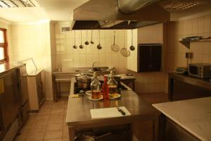 A kitchen or kitchenette at Uyku Vadisi Hotel