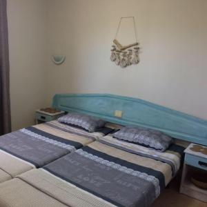2 Betten nebeneinander in einem Zimmer in der Unterkunft Casa Camar in Corralejo