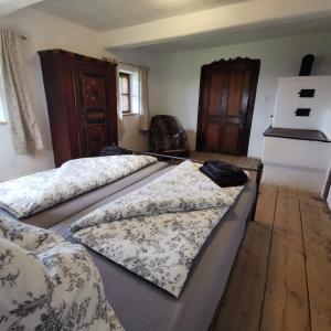 Letto o letti in una camera di Lutzmannalm
