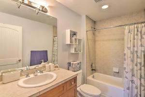 a bathroom with a sink and a toilet and a shower at 5 Mi to Ski Resort: Breck Penthouse Studio in Breckenridge +16 photos