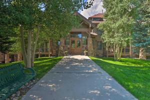 a walkway in front of a house with a bench at 5 Mi to Ski Resort: Breck Penthouse Studio in Breckenridge