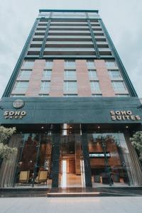 a building with the entrance to a one suite hotel at Hotel Soho Suites in San Francisco