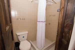 Kylpyhuone majoituspaikassa Hotel Casa del Colibri