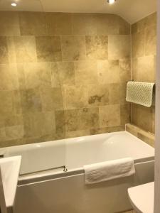 A bathroom at The White Swan 