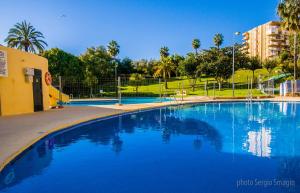 Bazén v ubytování 806 Minerva Apartamento - Vista al mar, la piscina y la montaña - Excelente wifi nebo v jeho okolí
