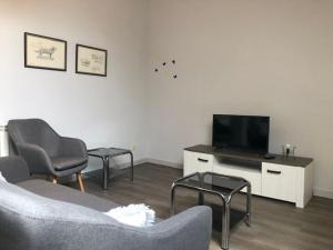 Televízia a/alebo spoločenská miestnosť v ubytovaní Casa Pauet d'Escalarre