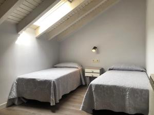 Posteľ alebo postele v izbe v ubytovaní Casa Pauet d'Escalarre