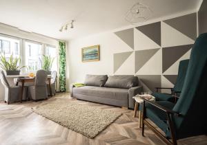 Posedenie v ubytovaní oompH Warsaw Central Apartment
