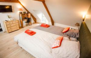 Кровать или кровати в номере La Petite Maison près de l'Eglise