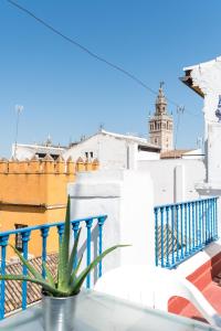 A balcony or terrace at Doña Elvira Suites Cathedral