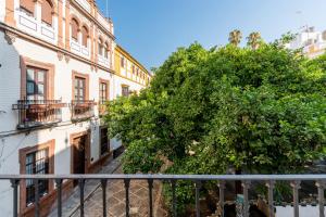 A balcony or terrace at Doña Elvira Suites Cathedral