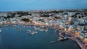 an aerial view of a harbor with boats in the water at Via Pisa 20 Mansarda in Bari