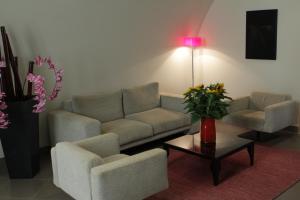 Posezení v ubytování Le Magnolie Hotel