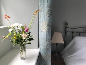 Ένα ή περισσότερα κρεβάτια σε δωμάτιο στο Andresna House