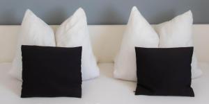 Posteľ alebo postele v izbe v ubytovaní Koller Apartmanház