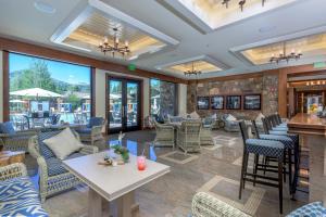 a lobby of a restaurant with chairs and tables at Atelier 1085 in Sun Valley