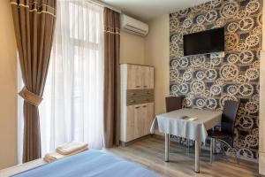 Μια τηλεόραση ή/και κέντρο ψυχαγωγίας στο BOLERO Suites