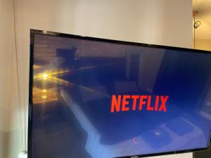 Televízia a/alebo spoločenská miestnosť v ubytovaní Rakowicka Top Apartaments Superior